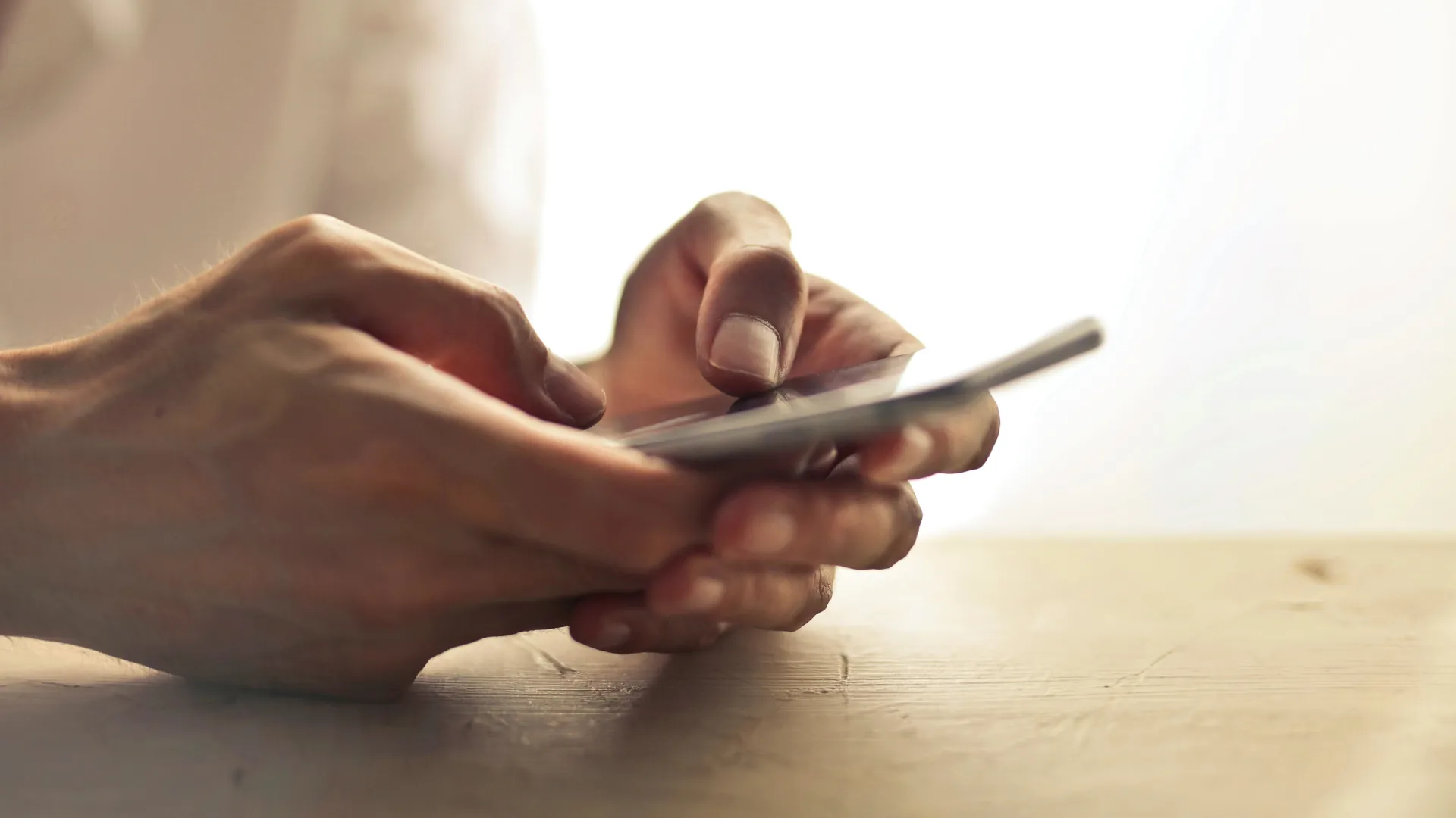 Person getting in touch with Mindworks Wirral from their mobile phone.